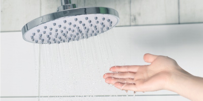 touching water from shower head