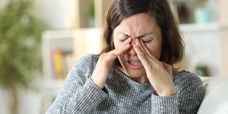 woman dealing with sinus issues