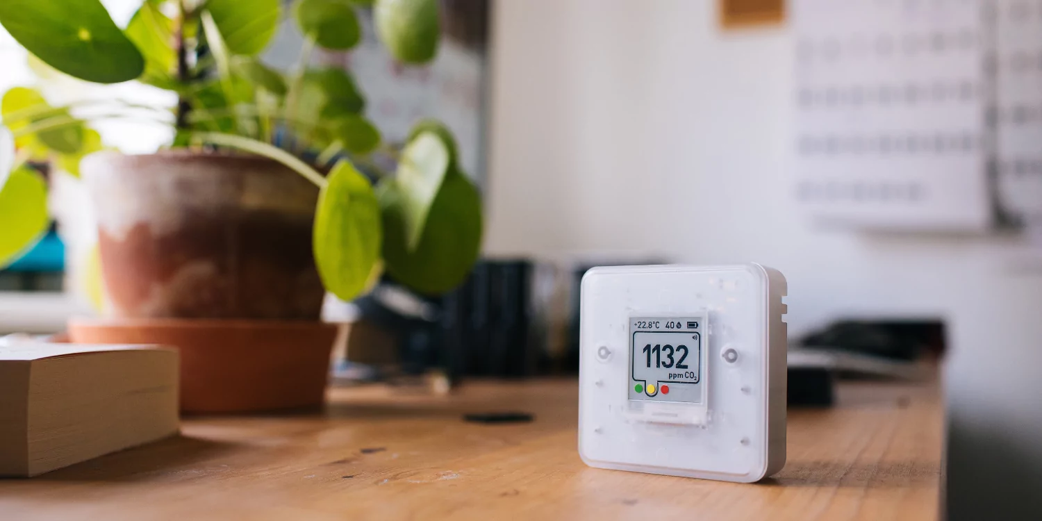 Monitor checking the indoor air quality in home - 4 Ways to Reduce Indoor Air Contaminants in Your Home